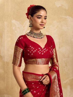 Buy red viscose silk saree with a bandhani pattern and zari border.