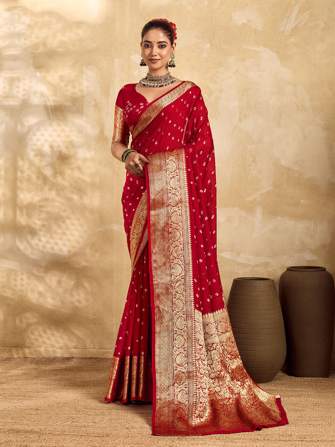 Buy red viscose silk saree with a bandhani pattern and zari border.