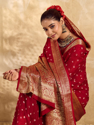 Buy red viscose silk saree with a bandhani pattern and zari border.