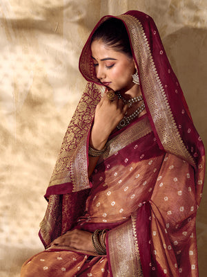 Buy silk saree for festive wear in maroon colour