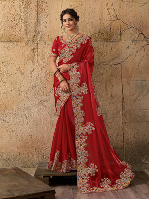 A red saree with floral embroidery
