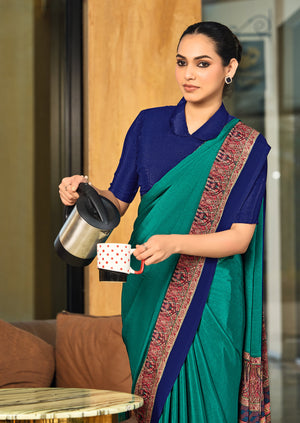 green and blue crepe silk saree with a red border under 1500