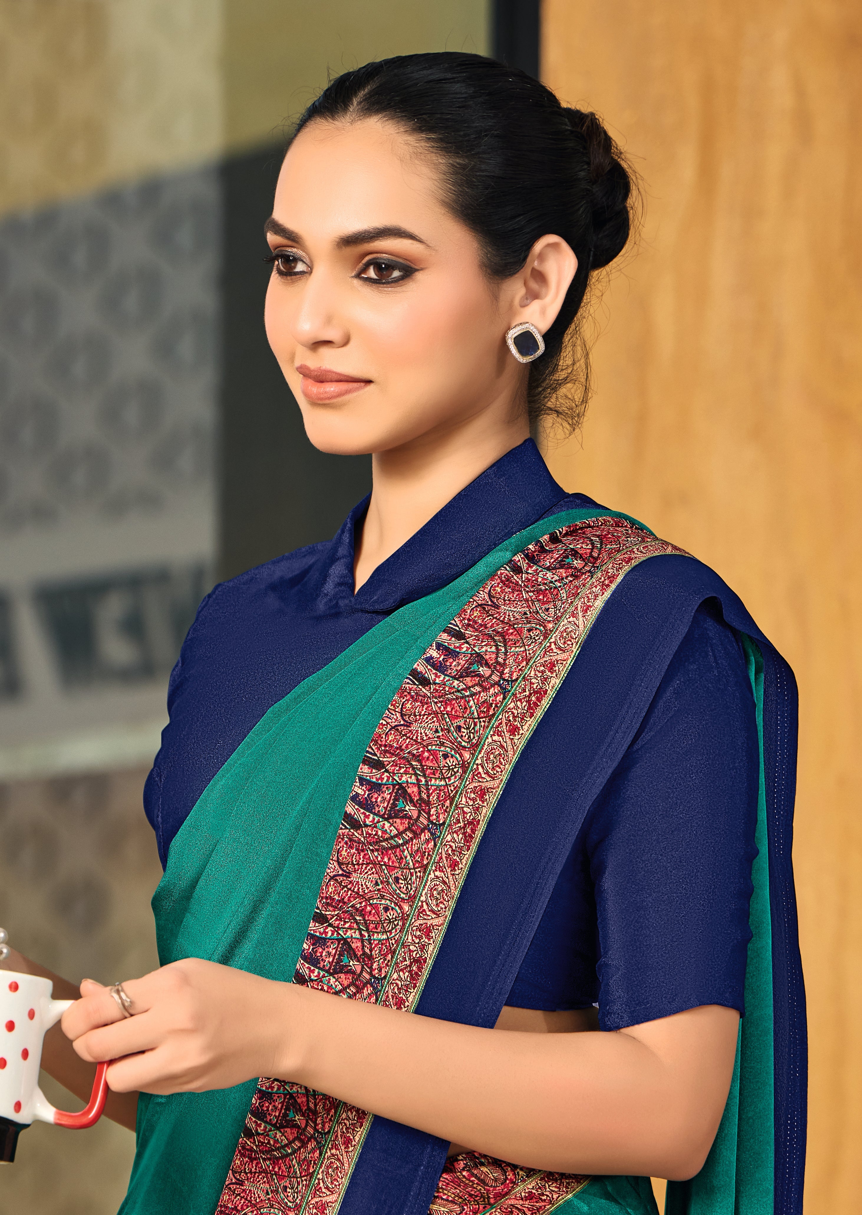 green and blue crepe silk saree with a red border under 1500