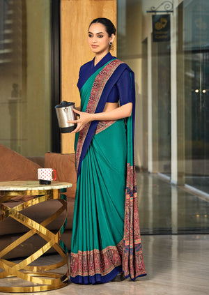 green and blue crepe silk saree with a red border under 1500