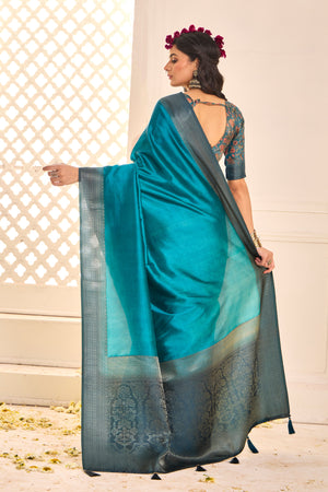 A sky blue and black tissue silk Banarasi style saree