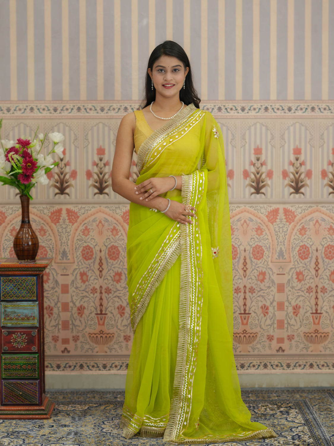 Yellow saree with silver gotapati work border for traditional design