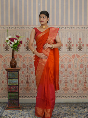 Red and orange saree with zardozi work and Banarasi style
