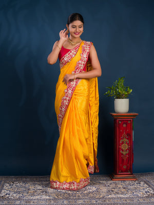 A yellow saree with red border Chinon Silk Bollywood Style With Sequence Gotapatti Work Saree