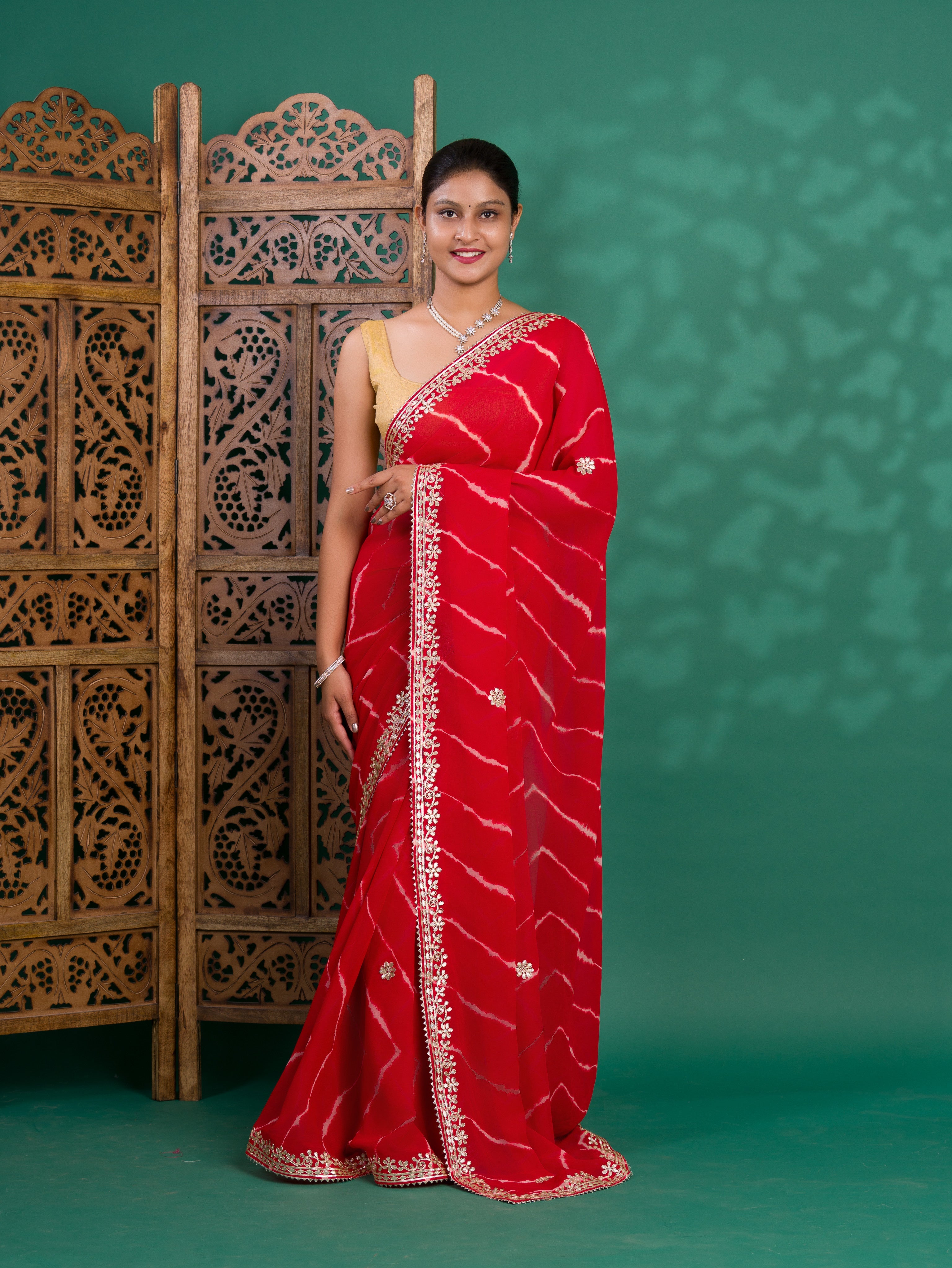 Chiffon Leheriya Style Wih Gotapatti Work Saree in red colour