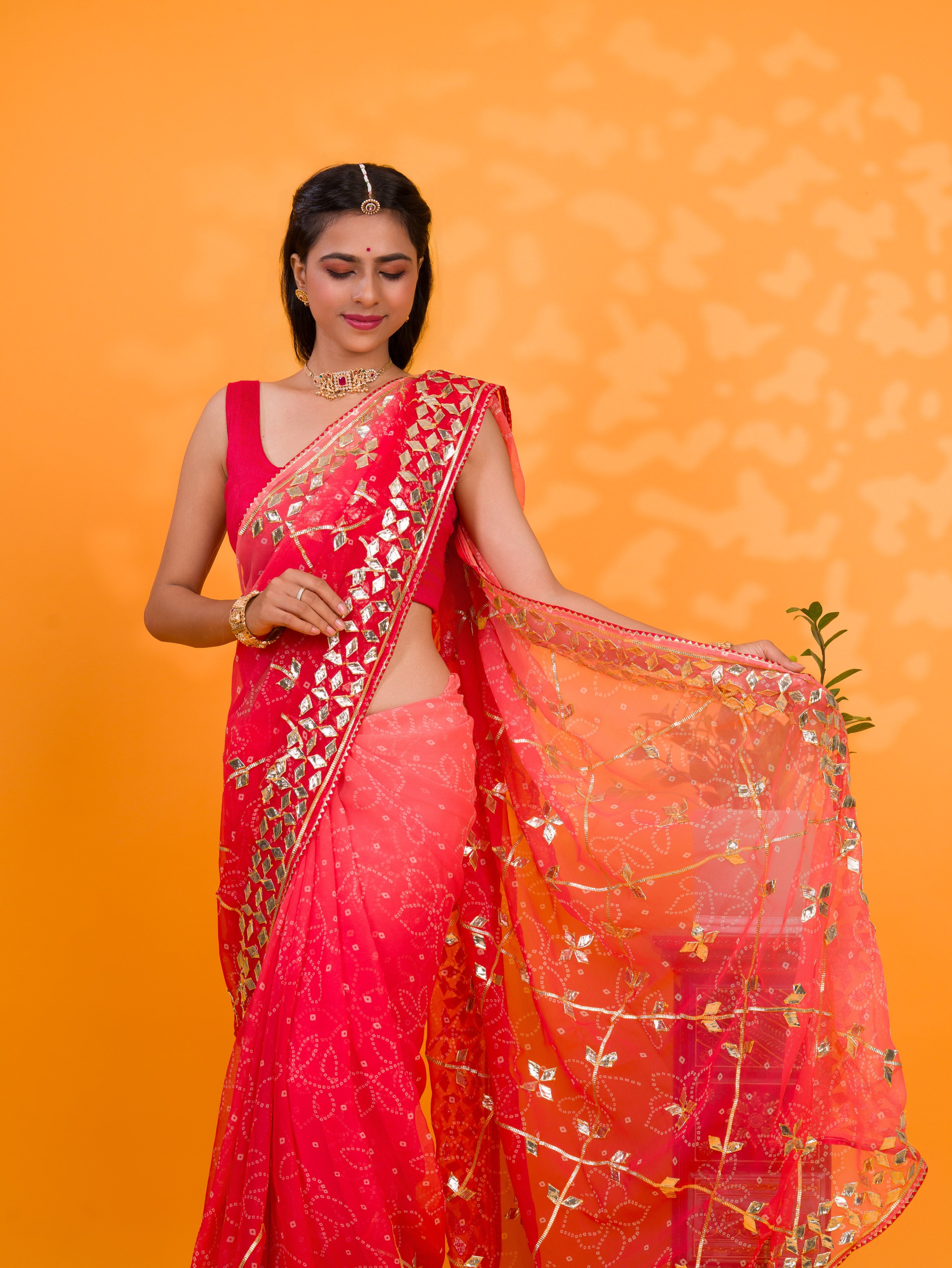 Bright red saree with gold patterns Chiffon Bandhani Style With Gotapatti Work Saree