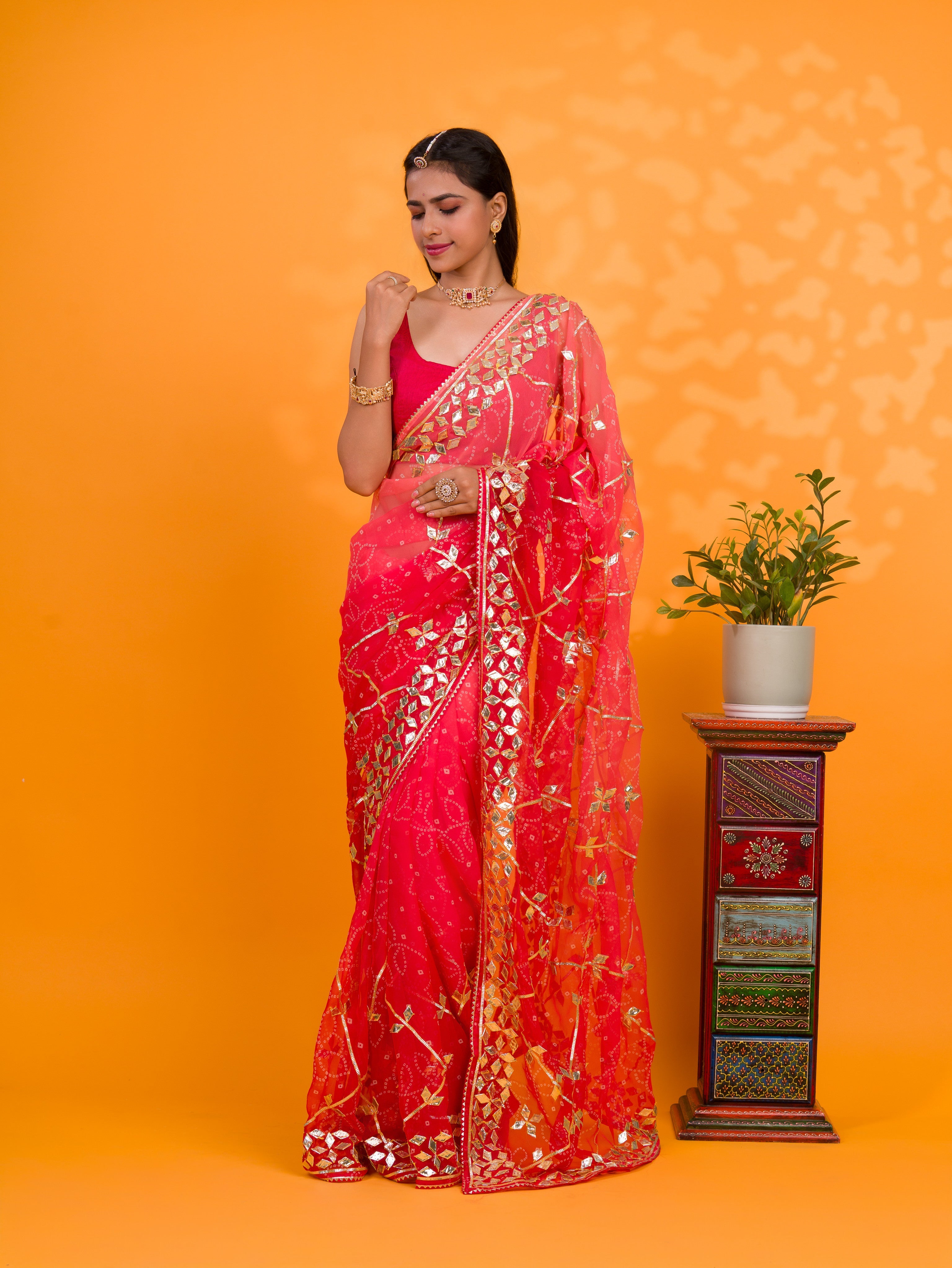Bright red saree with gold patterns Chiffon Bandhani Style With Gotapatti Work Saree