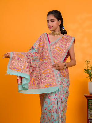 A orenge cotton silk saree with Kashmiri style patterns and Meenakari weaving work.
