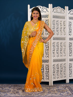 Yellow saree with white patterns Chiffon Bandhani Style With Gotapatti Work Saree