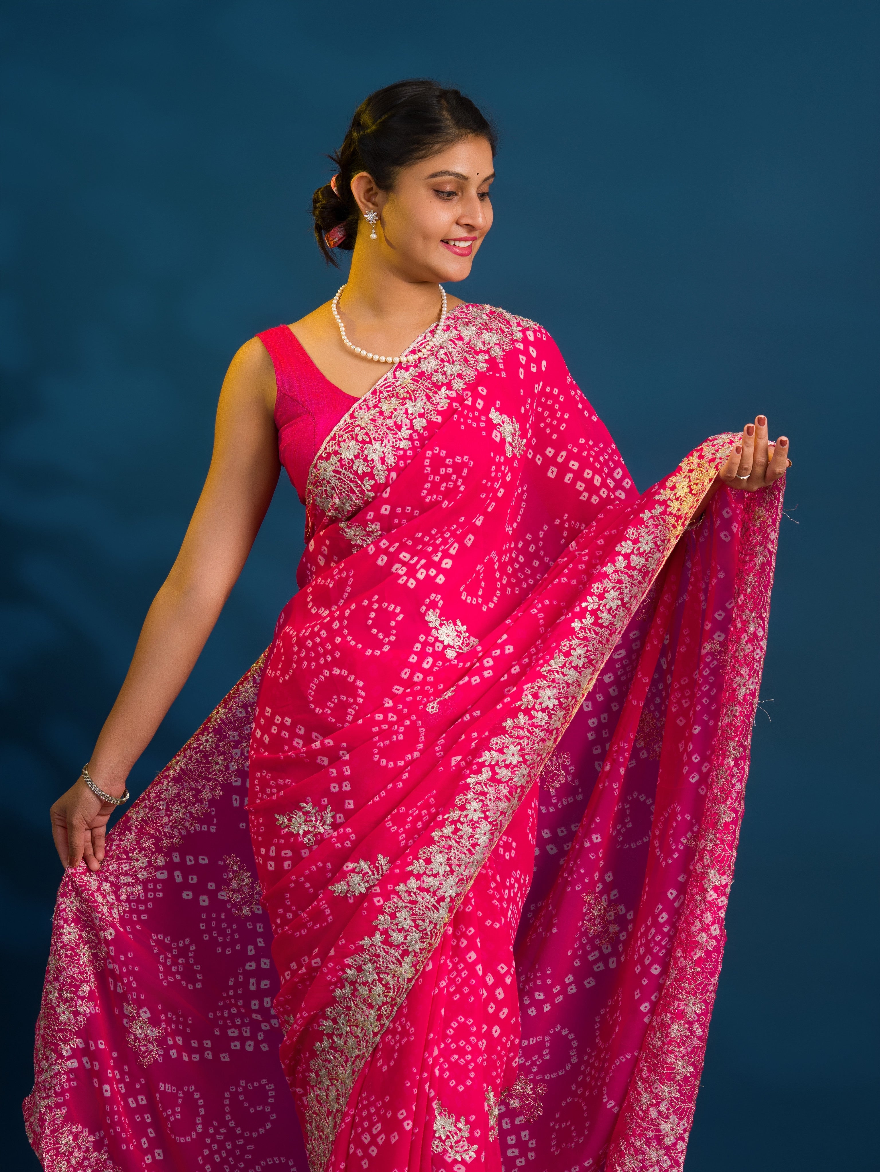 By Bandhani Saree With Elegant Peturn Work