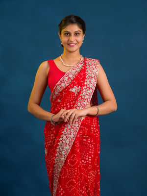 By Bandhani Saree With Elegant Peturn Work