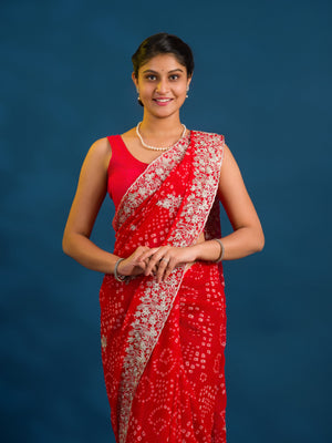 By Bandhani Saree With Elegant Peturn Work