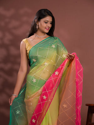 A green and pink saree with white gotapati work under 1000