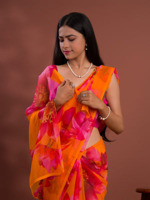A vibrant orange and pink floral saree Georgette Flower Printed Style