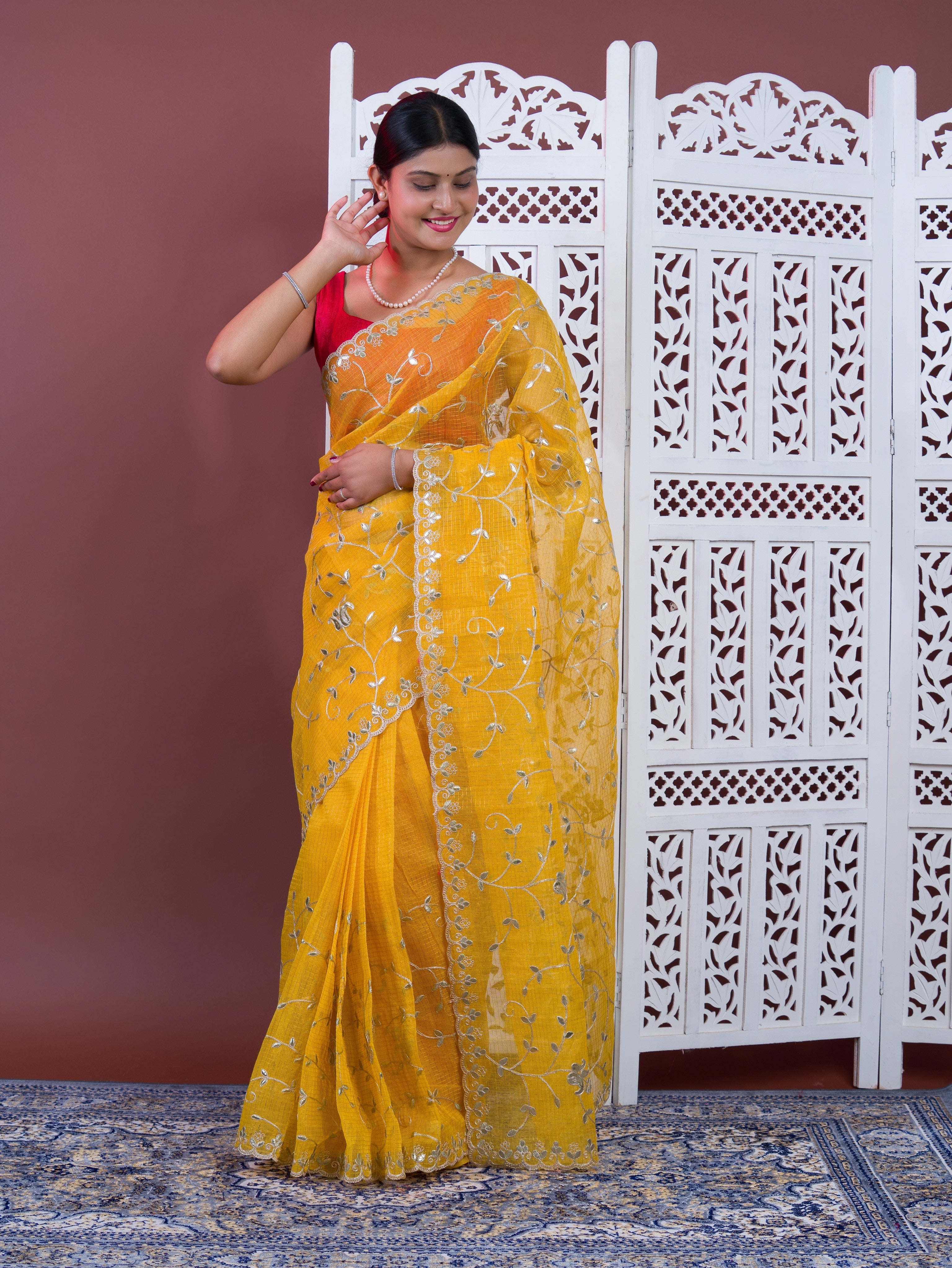 Gotapatti work in yellow colour saree