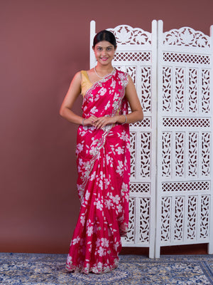 A pink floral saree with white pattern Printed Crepe Silk with Embroidered Mirror Work