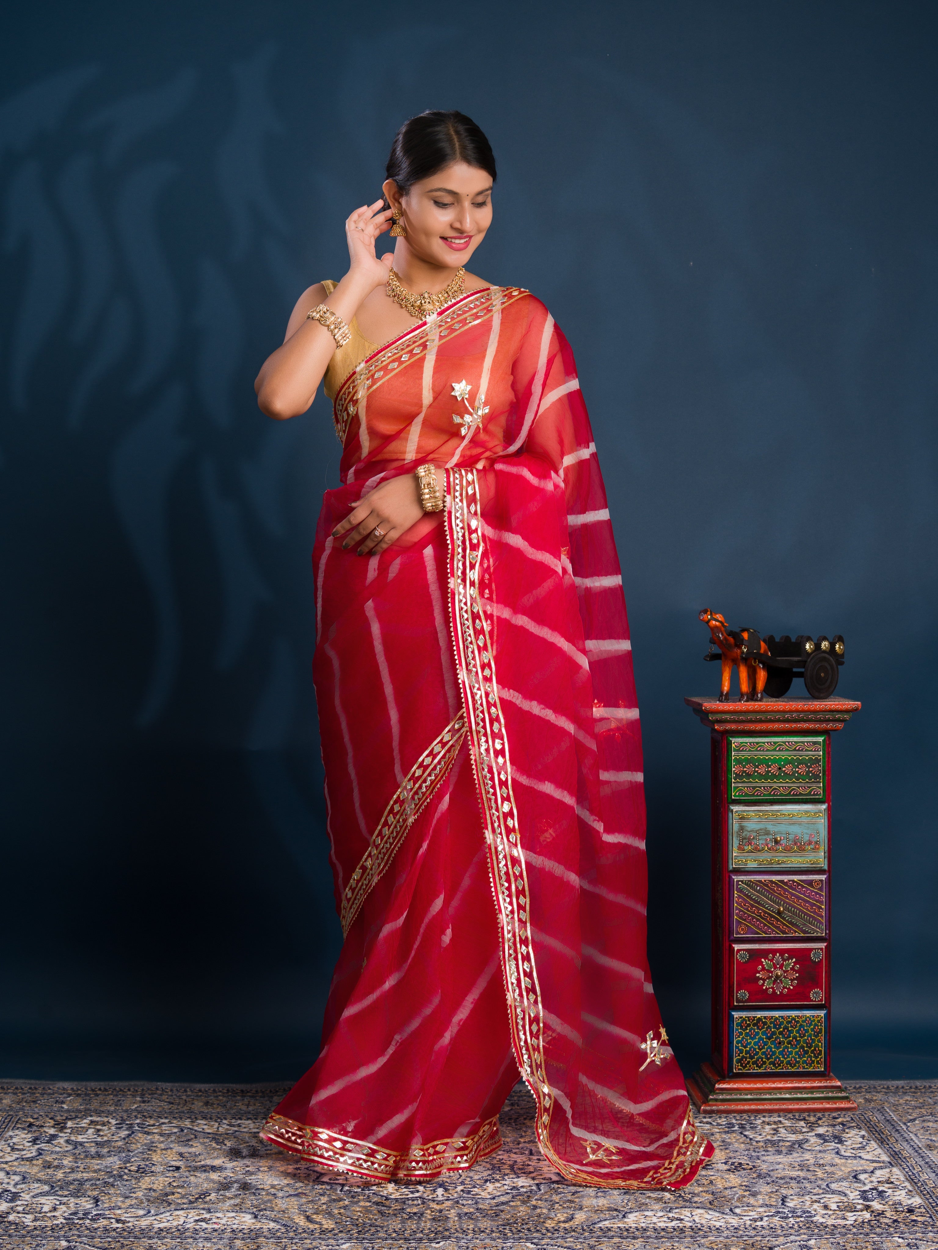 Red saree with gold patterns Organza Leheriya Style With Gotapatti Work