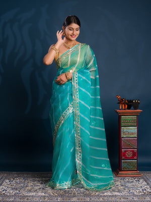 Teal sareewith Silver patterns Organza Leheriya Style With Gotapatti Work