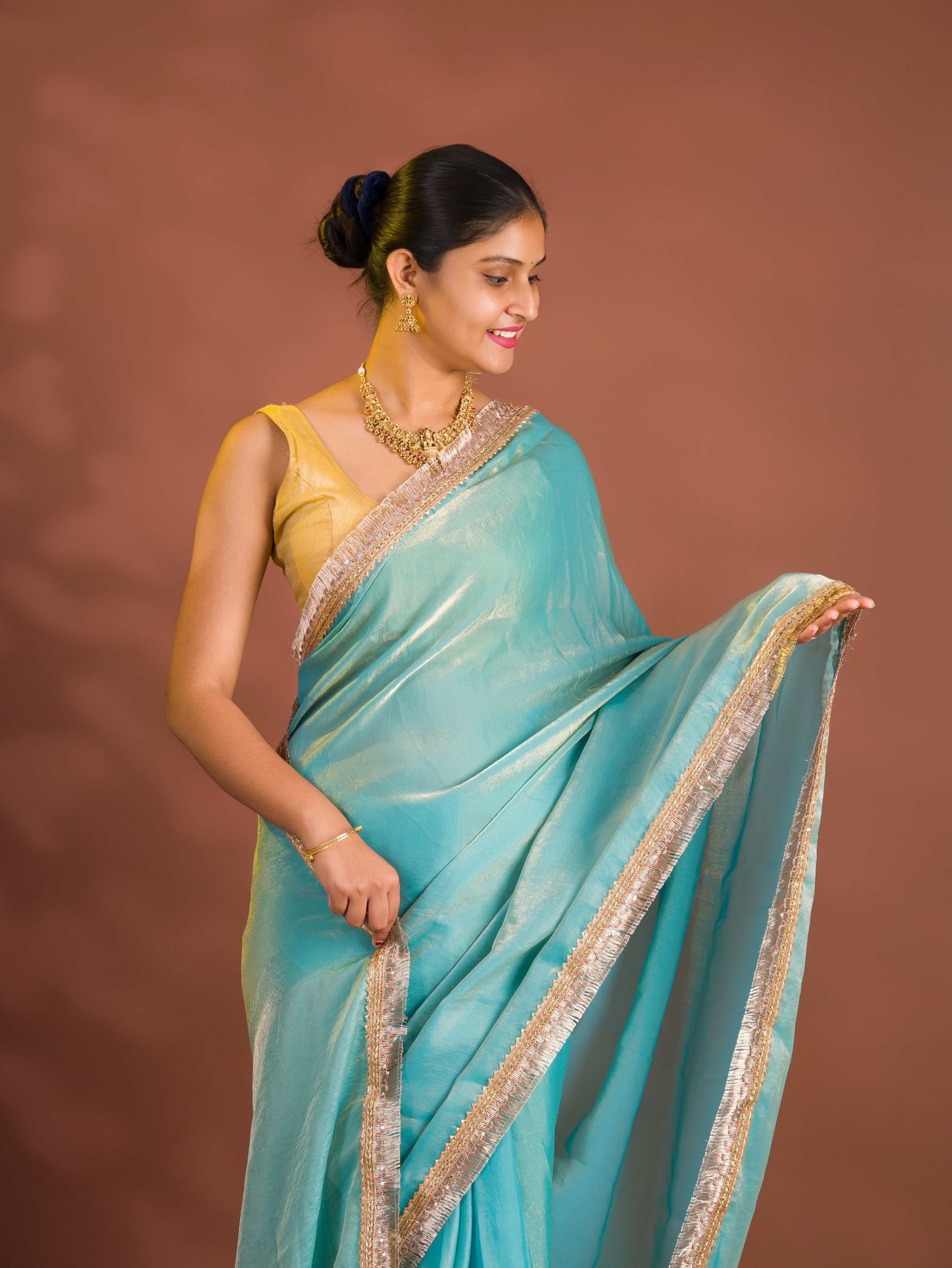 By Chiffon Tissue Saree With Party Wear