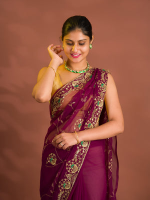 By Traditional Style With Handcrafted Aari tari Work