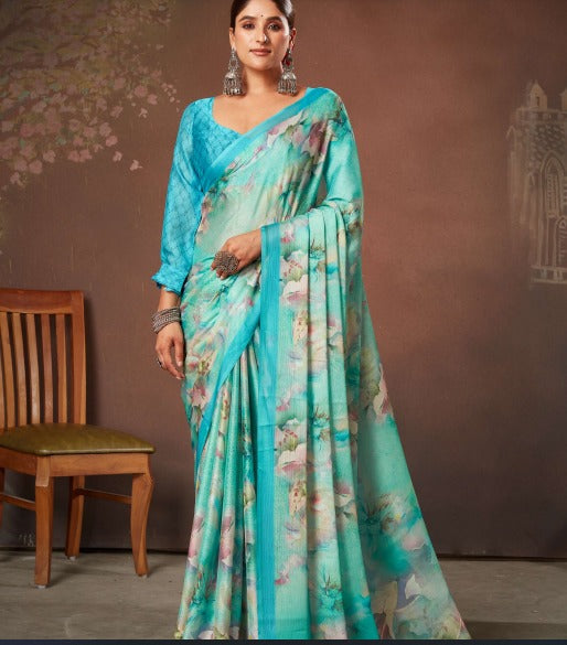 A sky blue chiffon saree with a floral print