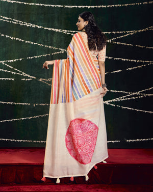 A multicolored cotton silk printed Bollywood saree with a traditional design, featuring stripes and floral patterns