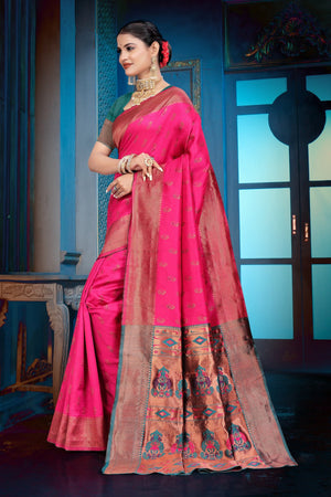 A pink and purple Banarasi Dola Silk saree with traditional Zari print work,