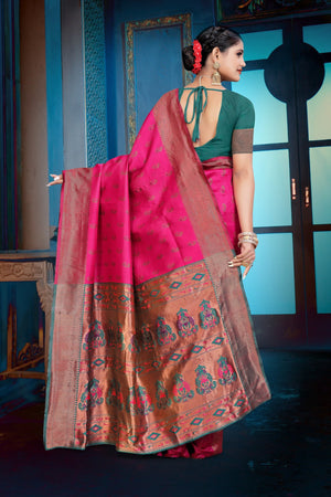 A pink and purple Banarasi Dola Silk saree with traditional Zari print work,