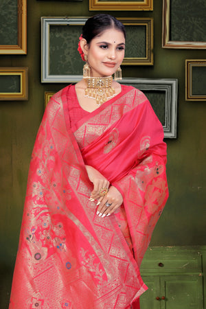 A red and orange Banarasi saree with zari weaving and floral patterns,