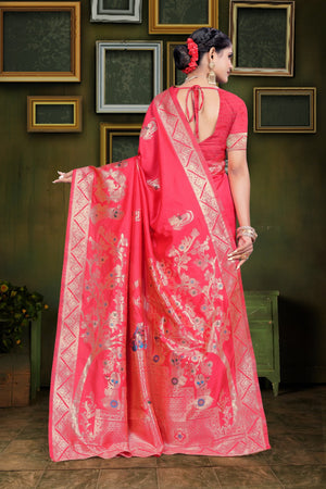 A red and orange Banarasi saree with zari weaving and floral patterns,
