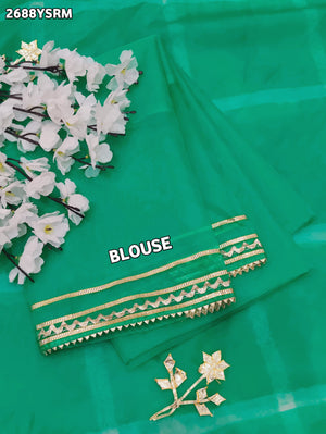 Teal sareewith Silver patterns Organza Leheriya Style With Gotapatti Work
