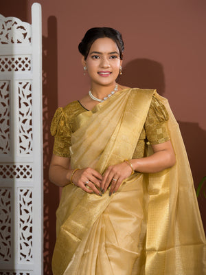 A golden Banarasi handloom saree with tissue silk