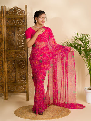 A rani colour geometric patterned saree with bandhani style dots under 500