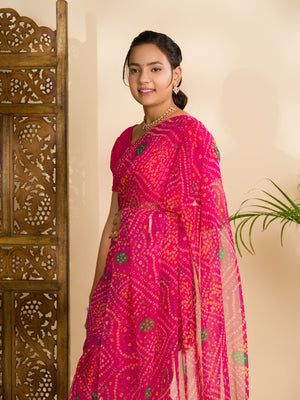 A rani colour geometric patterned saree with bandhani style dots under 500
