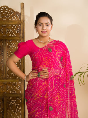 A rani colour geometric patterned saree with bandhani style dots under 500
