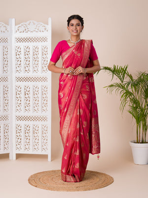 A red and golden Banarasi style saree with zari weaving,