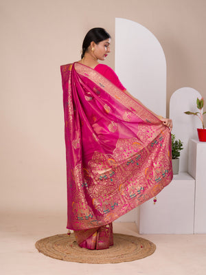 A pink Banarasi style saree with Meenakari weaving,