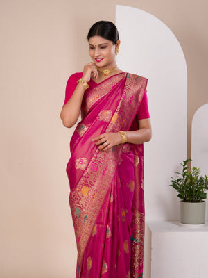 A pink Banarasi style saree with Meenakari weaving,