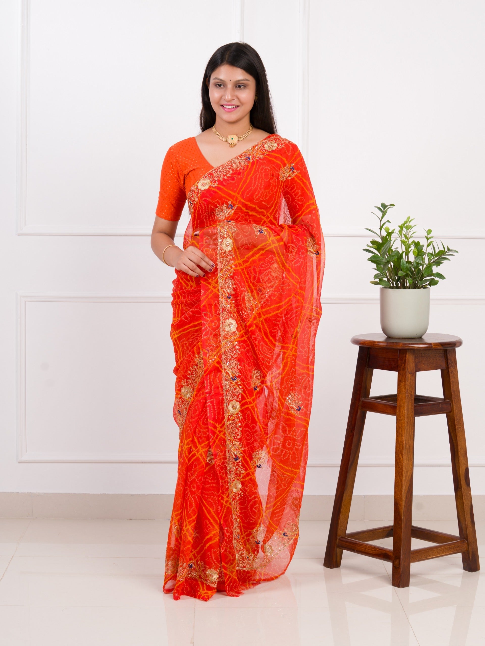 Tanmira latest Royal Bandhani Georgette Saree With Golden Embellishments Work JAY