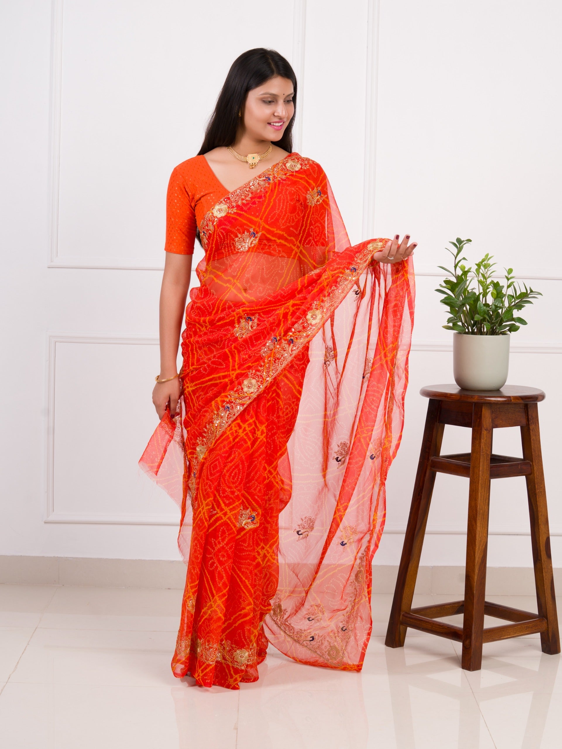 Tanmira latest Royal Bandhani Georgette Saree With Golden Embellishments Work JAY