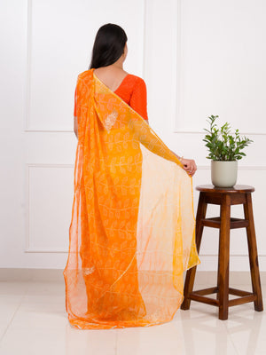 orange saree with a white print Chiffon Bandhani style With Vintage Work Saree