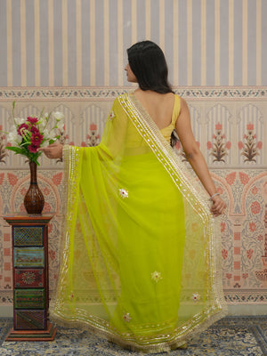 Yellow saree with silver gotapati work  border for traditional design 