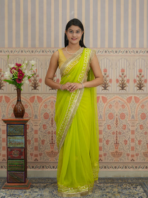 Yellow saree with silver gotapati work  border for traditional design 