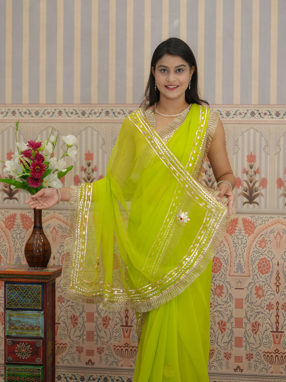 Yellow saree with silver gotapati work  border for traditional design 