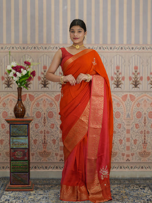 Red and orange saree with zardozi work and Banarasi style