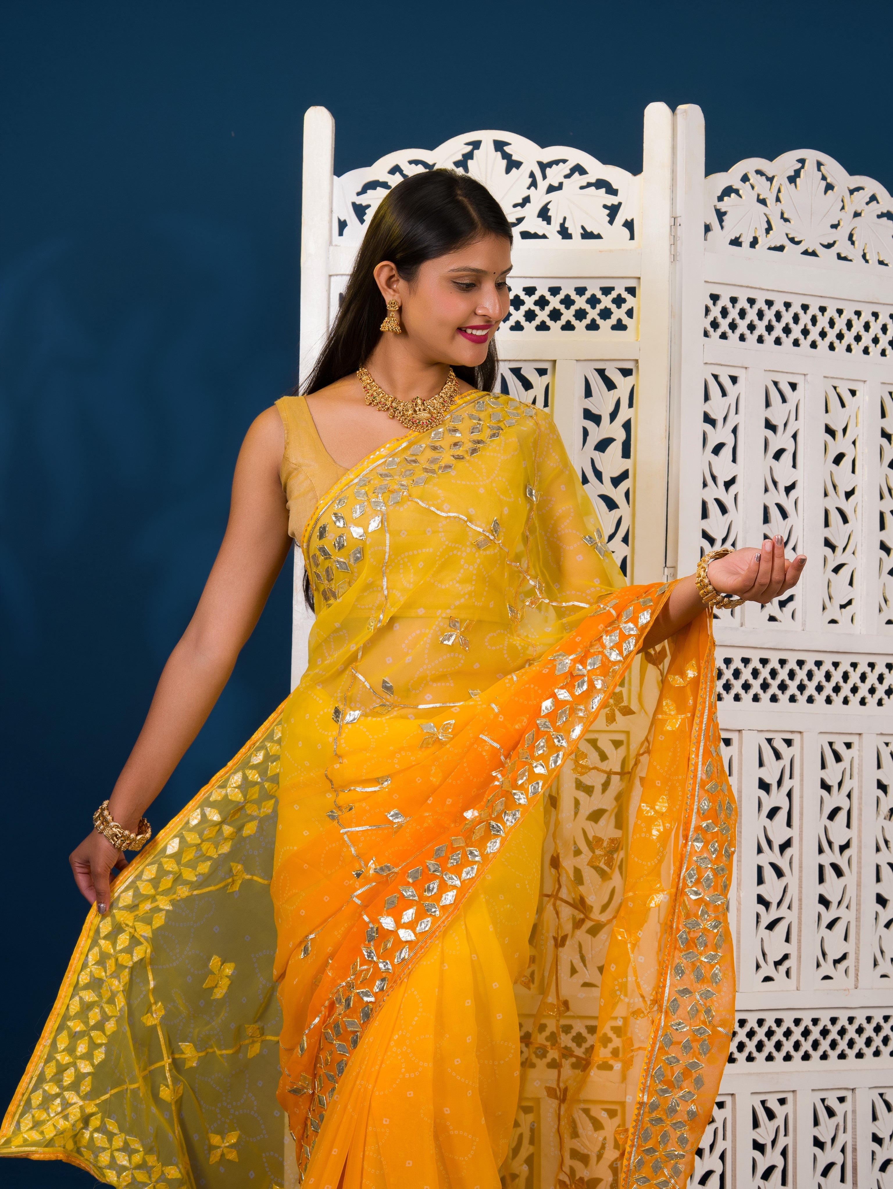  Yellow saree with white patterns  Chiffon Bandhani Style With Gotapatti Work Saree